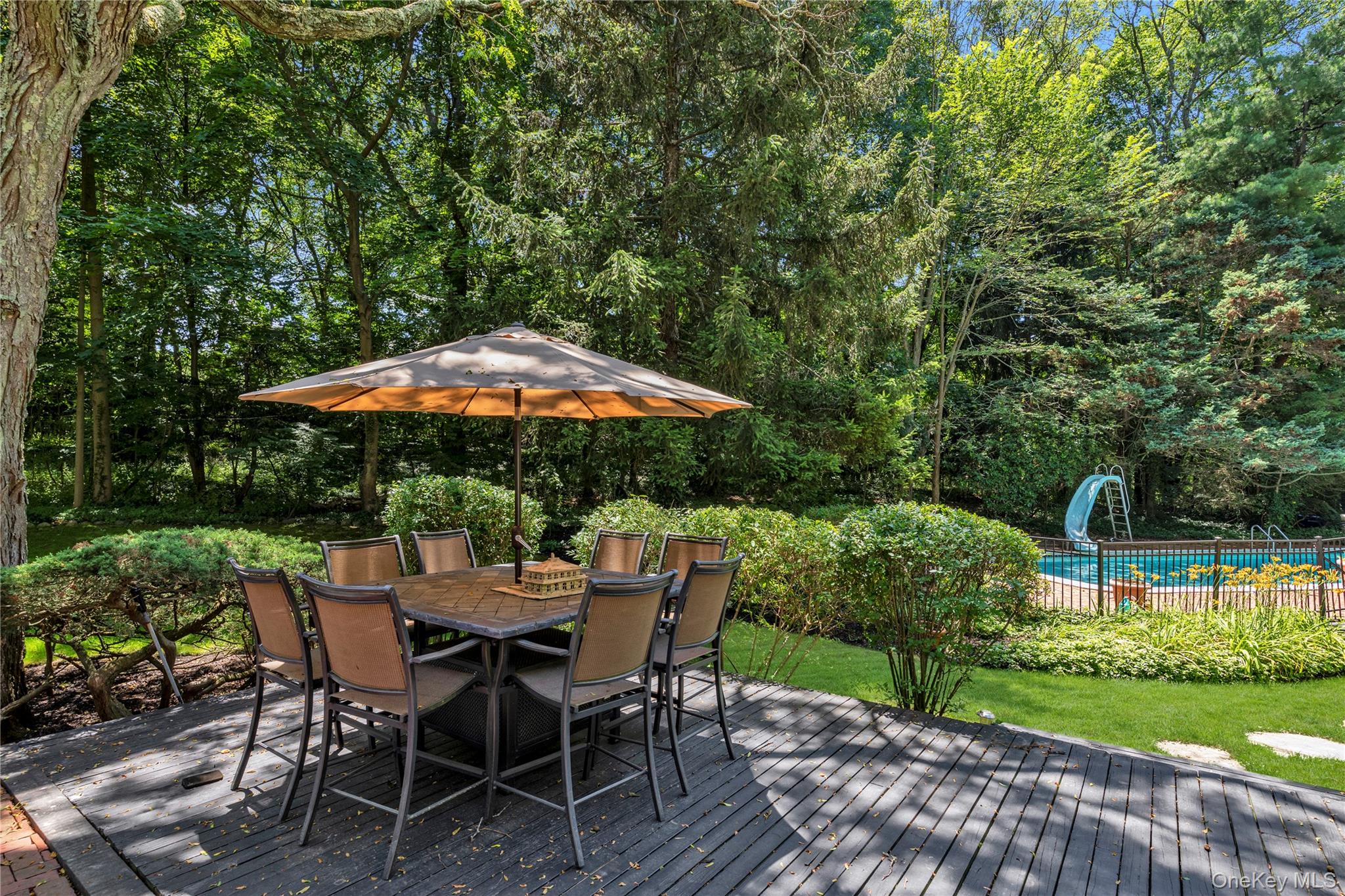 26 Rolling Drive Glen Head, NY 11545 - Photo 9 of 31 a view of backyard with seating space and green space