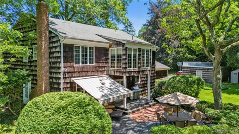front view of a house with a small yard