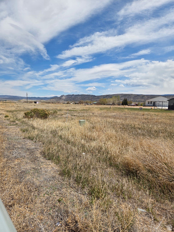 1448 Manila Way, Unit 3 Manila, UT 84046 - Photo 4 of 6 View of mountain backdrop with rural landscape