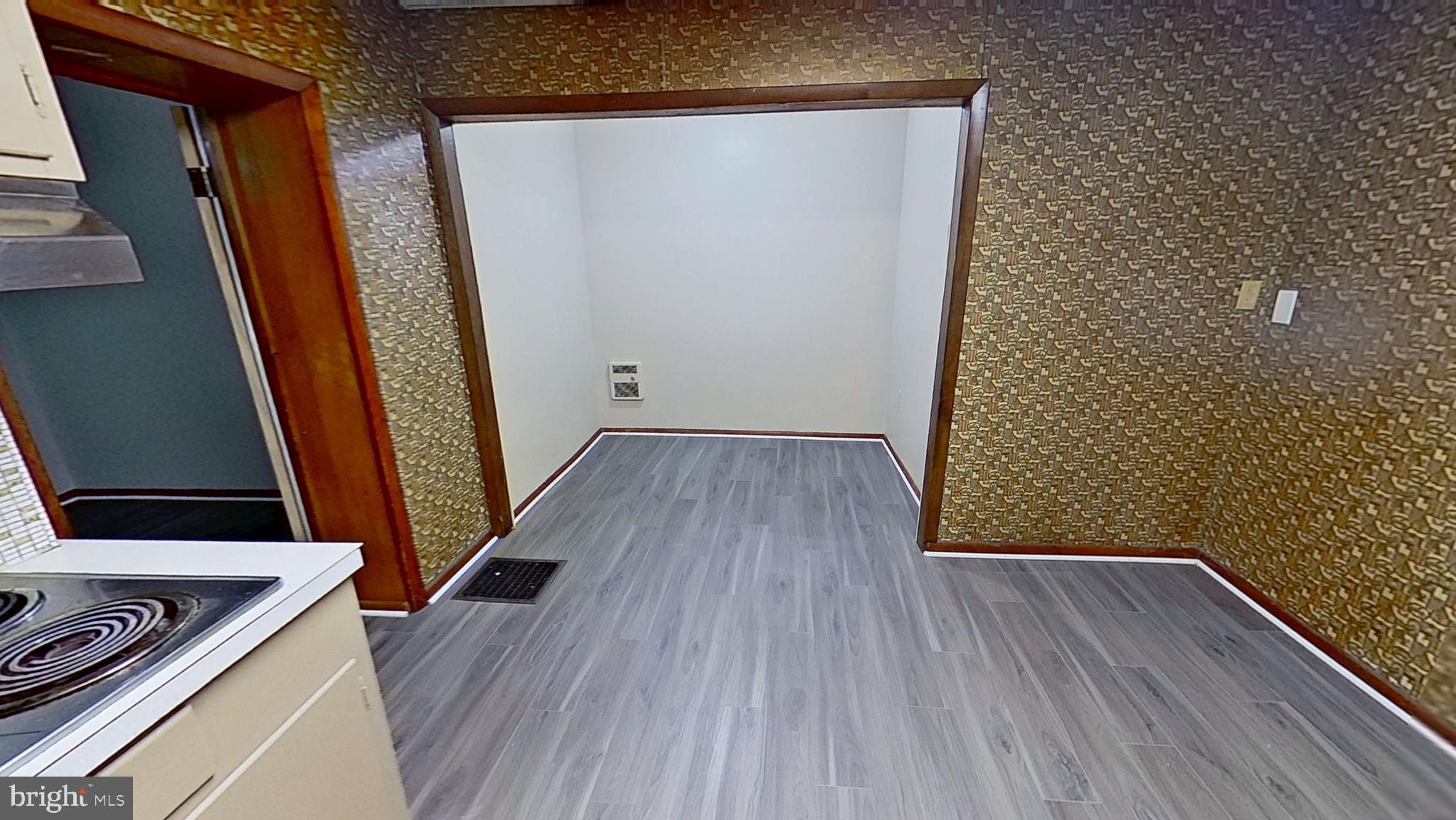 648 Broadway, Unit E Hanover, PA 17331 - Photo 10 of 12 a view of front door with wooden floor