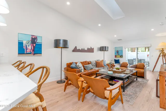 a living room with furniture and rug
