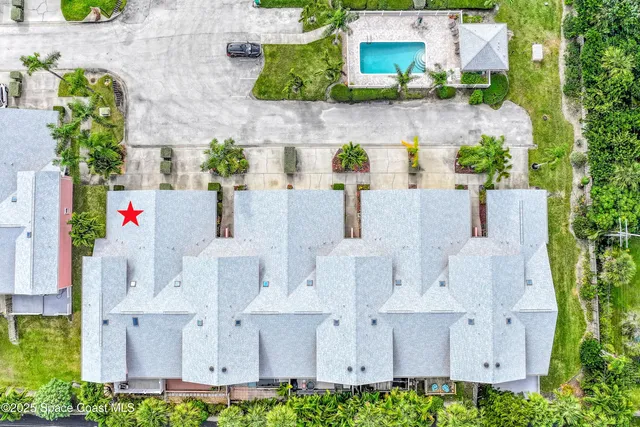 a view of a wooden bench in backyard