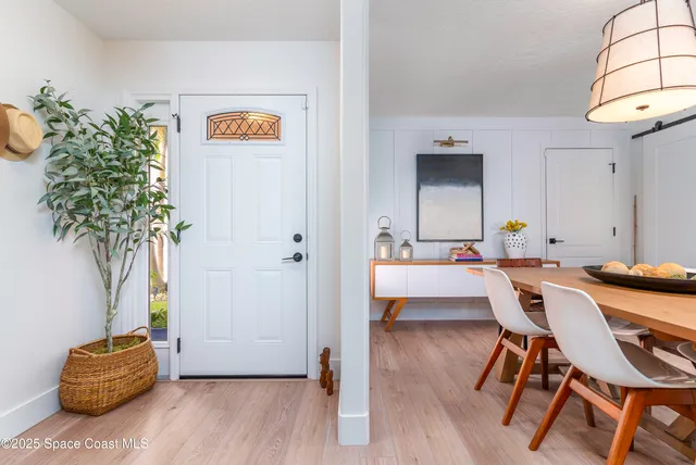 a view of a workspace with furniture