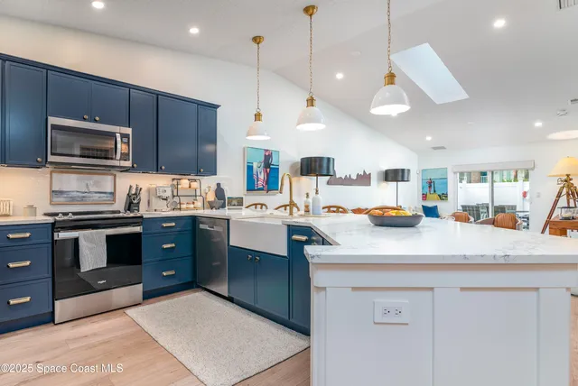a en suite bathroom with a tub shower and sink