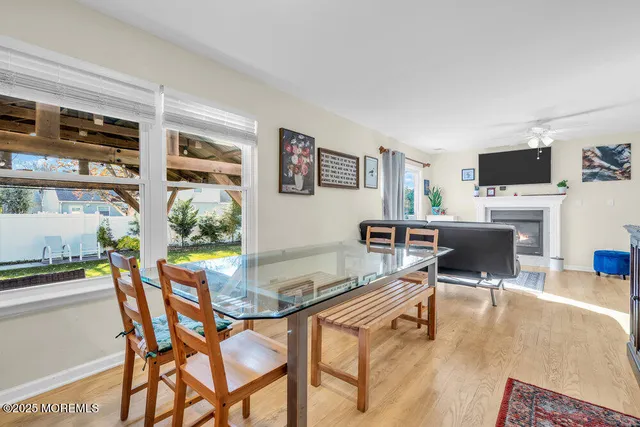 a outdoor living space with furniture and a flat screen tv