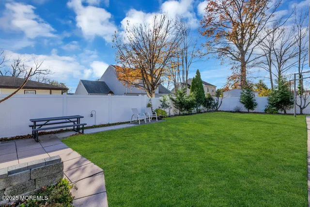 a view of yard with seating space