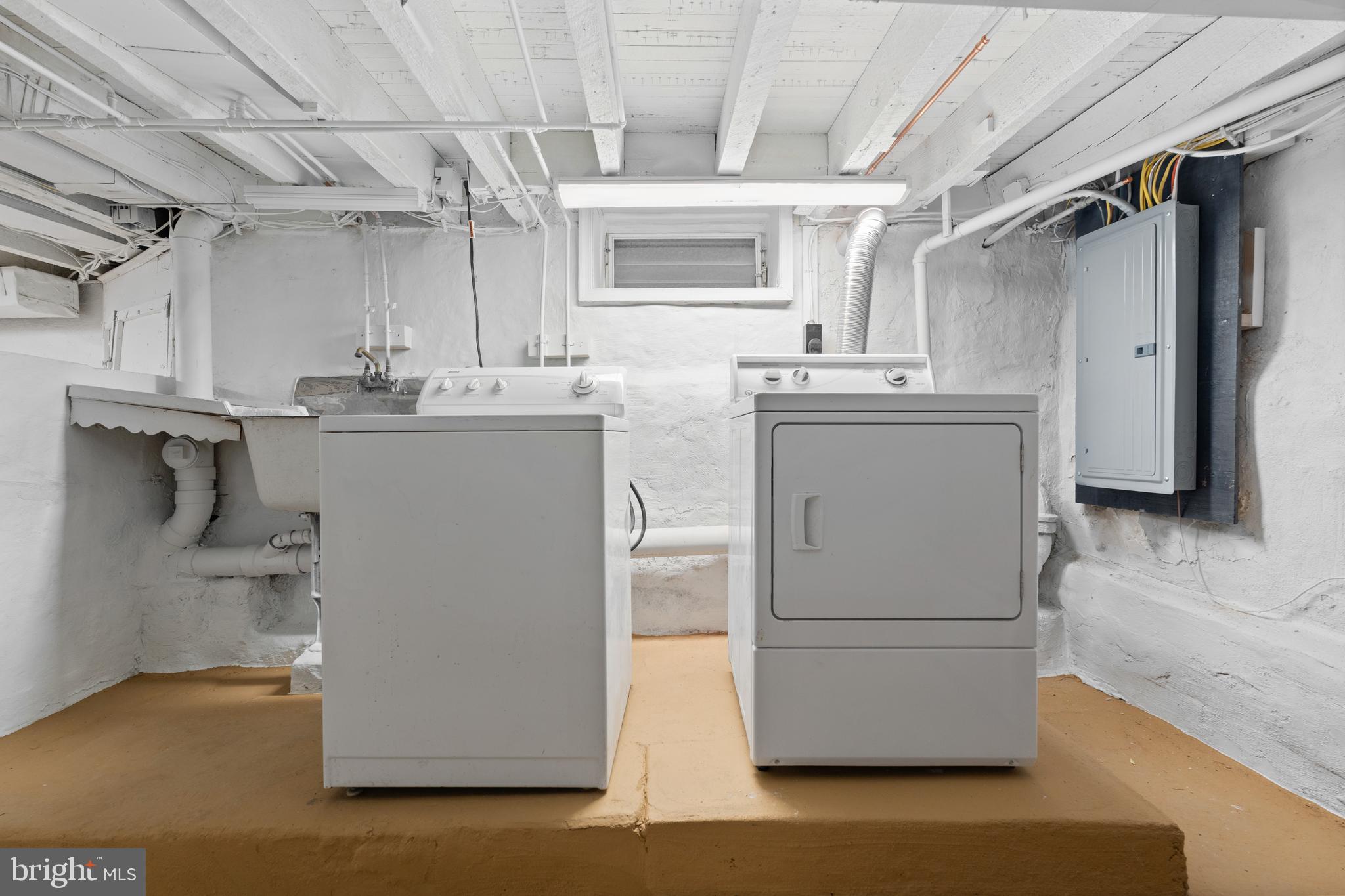 244 Mifflin Street Philadelphia, PA 19148 - Photo 19 of 21 a utility room with dryer and washer