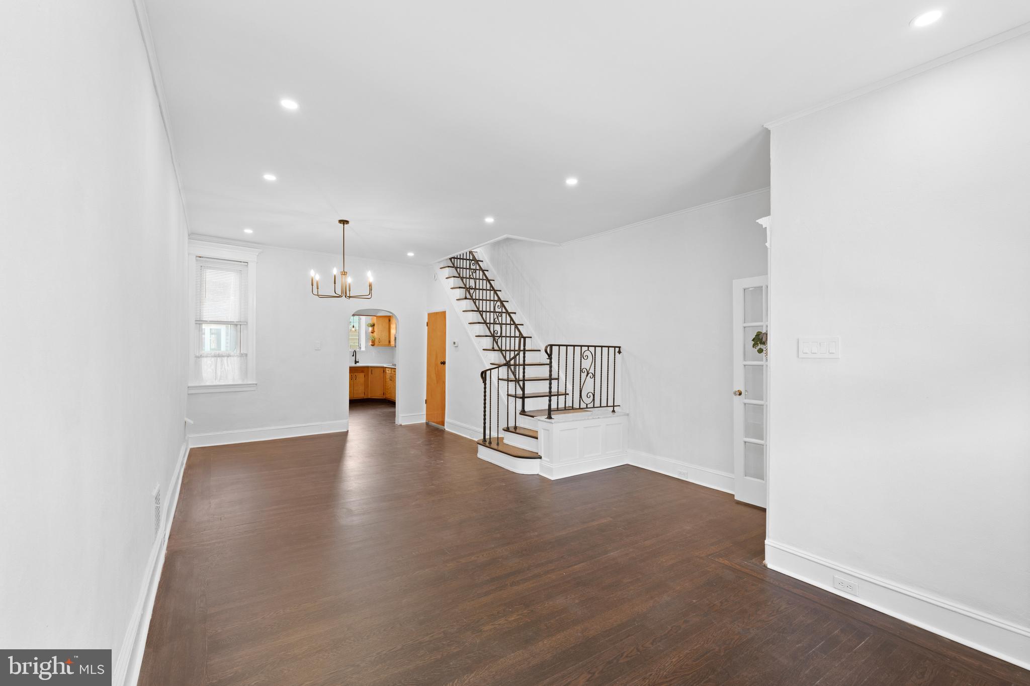 244 Mifflin Street Philadelphia, PA 19148 - Photo 3 of 21 a big room with wooden floor and windows