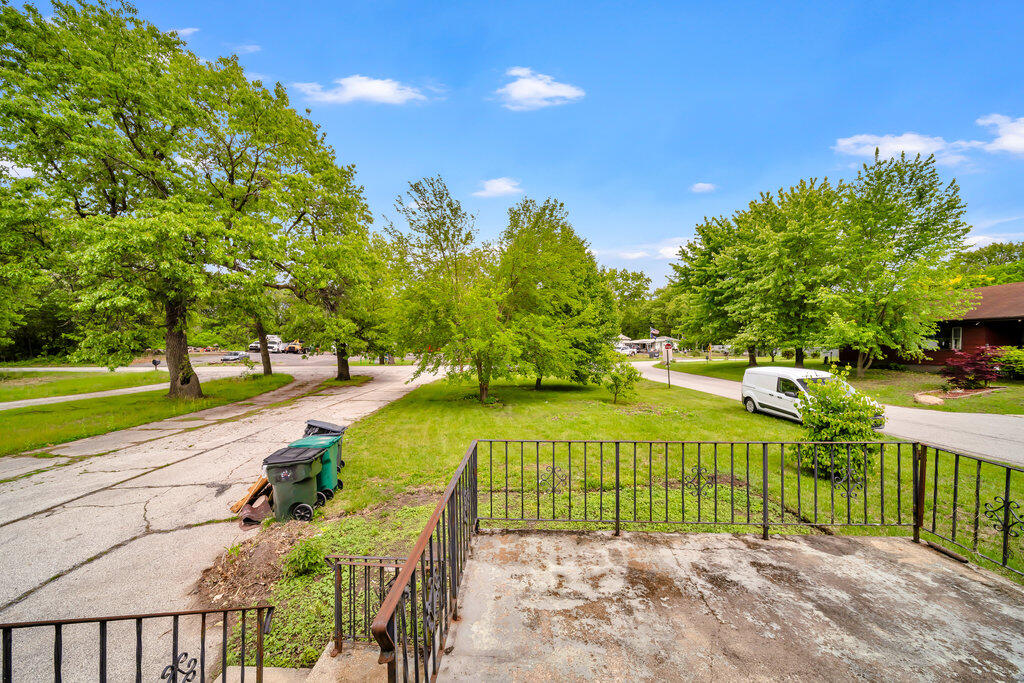 3936 Ross Road Gary, IN 46408 - Photo 16 of 18 a view of a pathway with a garden