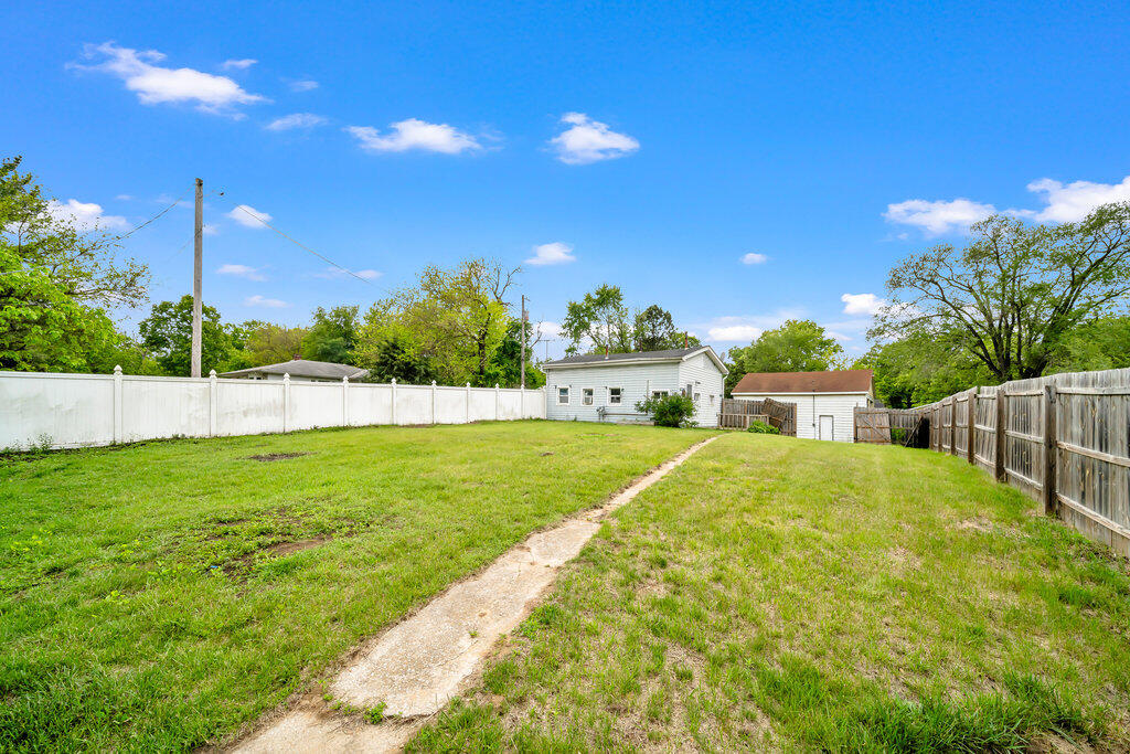 3936 Ross Road Gary, IN 46408 - Photo 17 of 18 a house view with swimming pool and yard