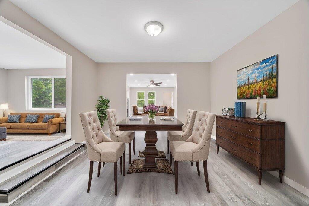 3936 Ross Road Gary, IN 46408 - Photo 5 of 18 a view of a dining room with furniture window and wooden floor
