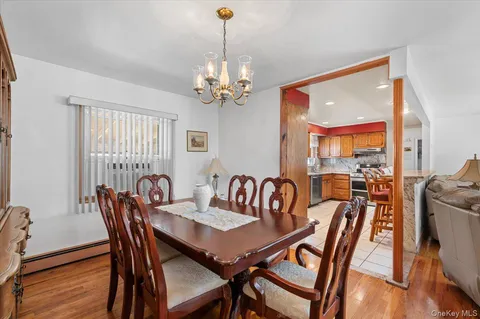 a kitchen with a stove a sink and a refrigerator