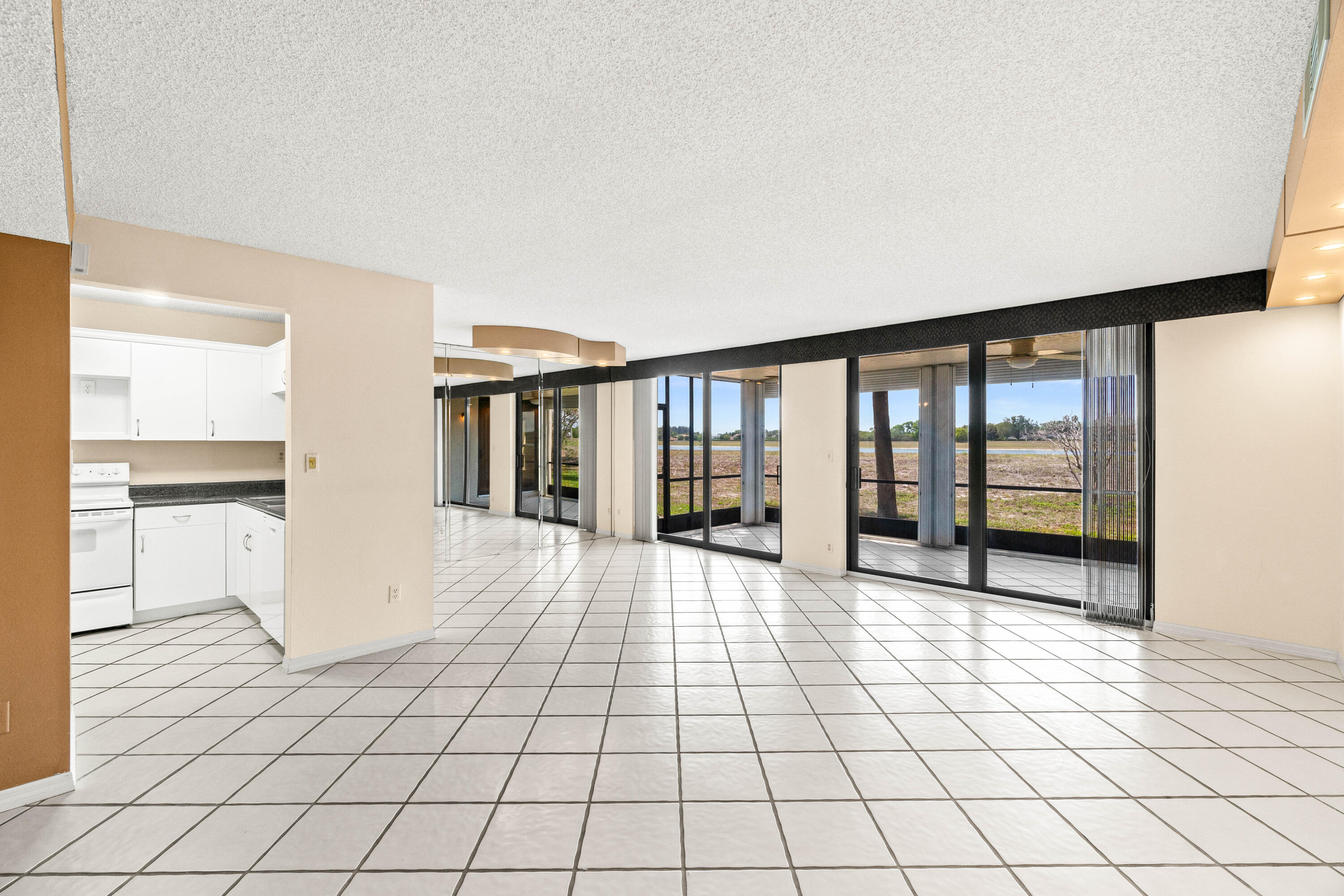 10920 Lakemore Lane, Unit 101 Boca Raton, FL 33498 - Photo 13 of 41 a view of an empty room and window