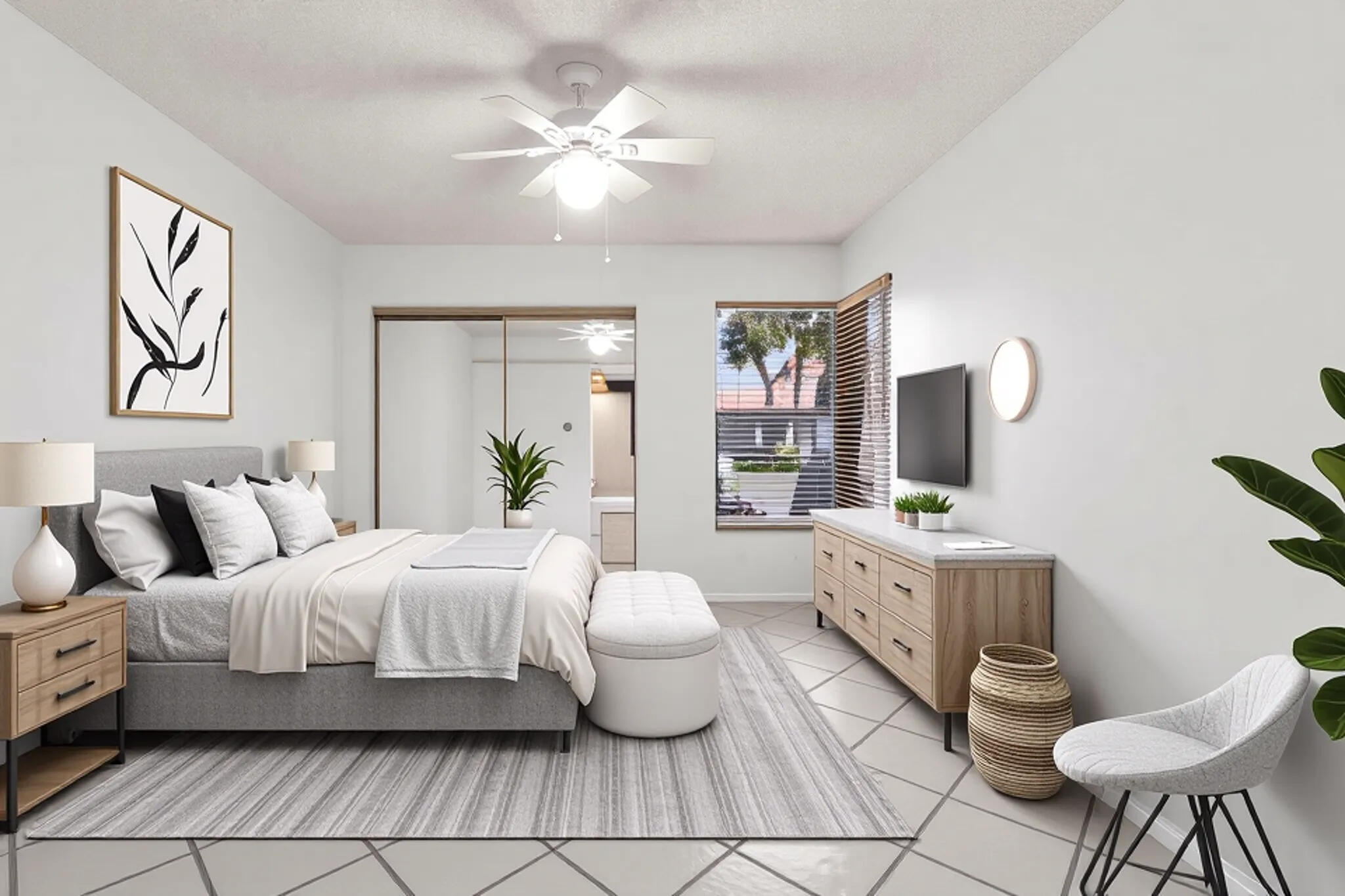 10920 Lakemore Lane, Unit 101 Boca Raton, FL 33498 - Photo 30 of 41 a bedroom with a bed and a chandelier