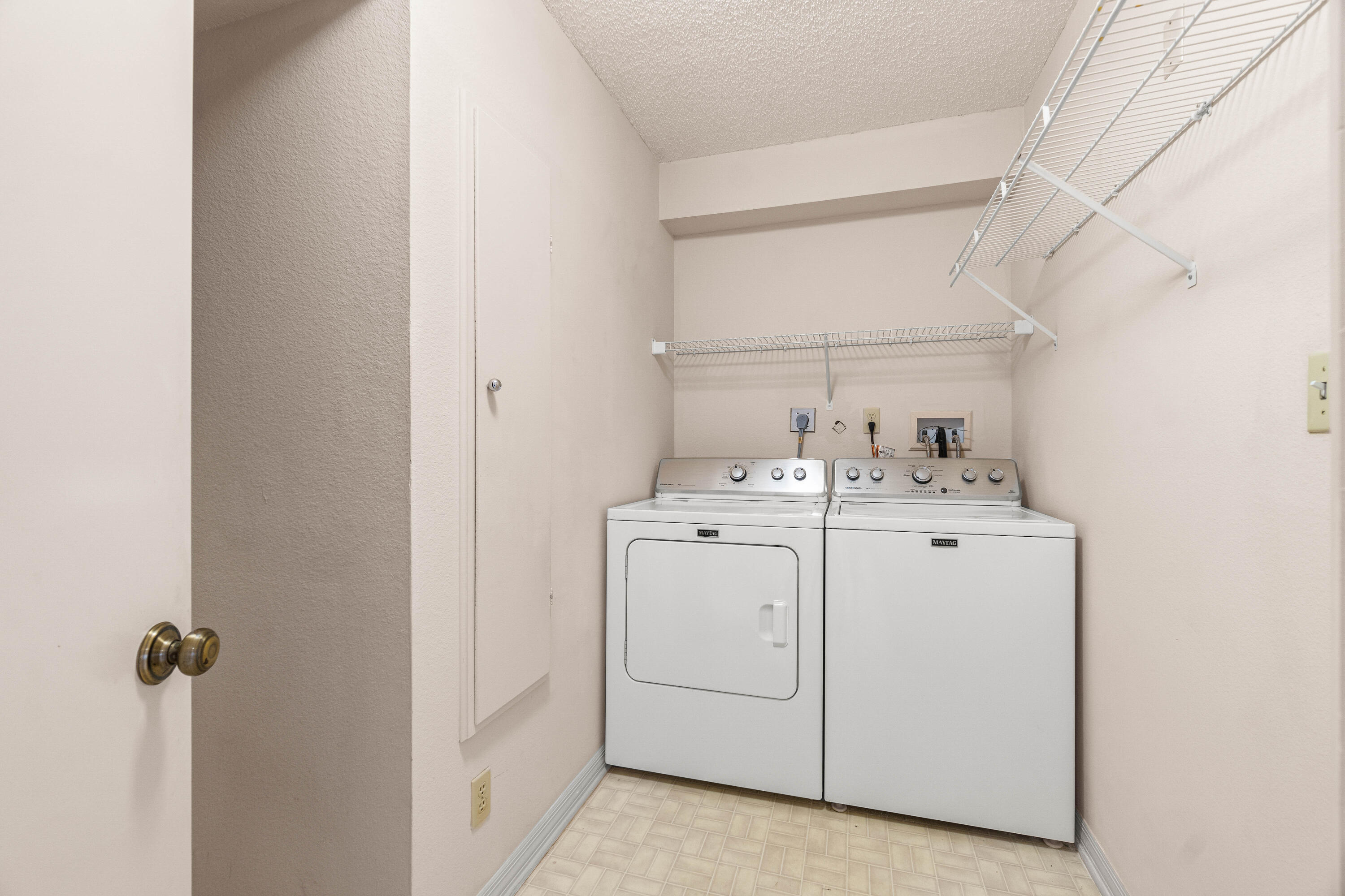 10920 Lakemore Lane, Unit 101 Boca Raton, FL 33498 - Photo 34 of 41 a utility room with dryer and washer