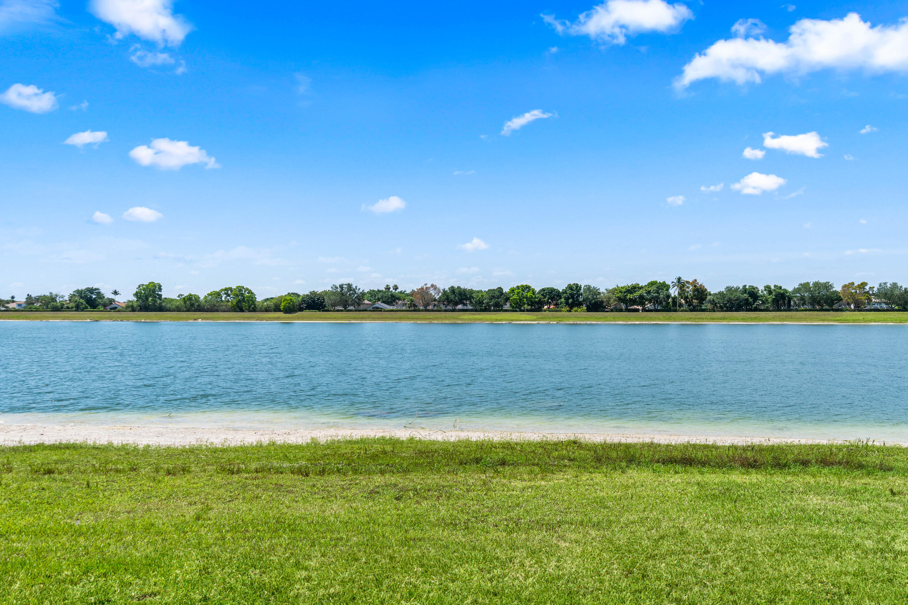 10920 Lakemore Lane, Unit 101 Boca Raton, FL 33498 - Photo 38 of 41 a view of a lake