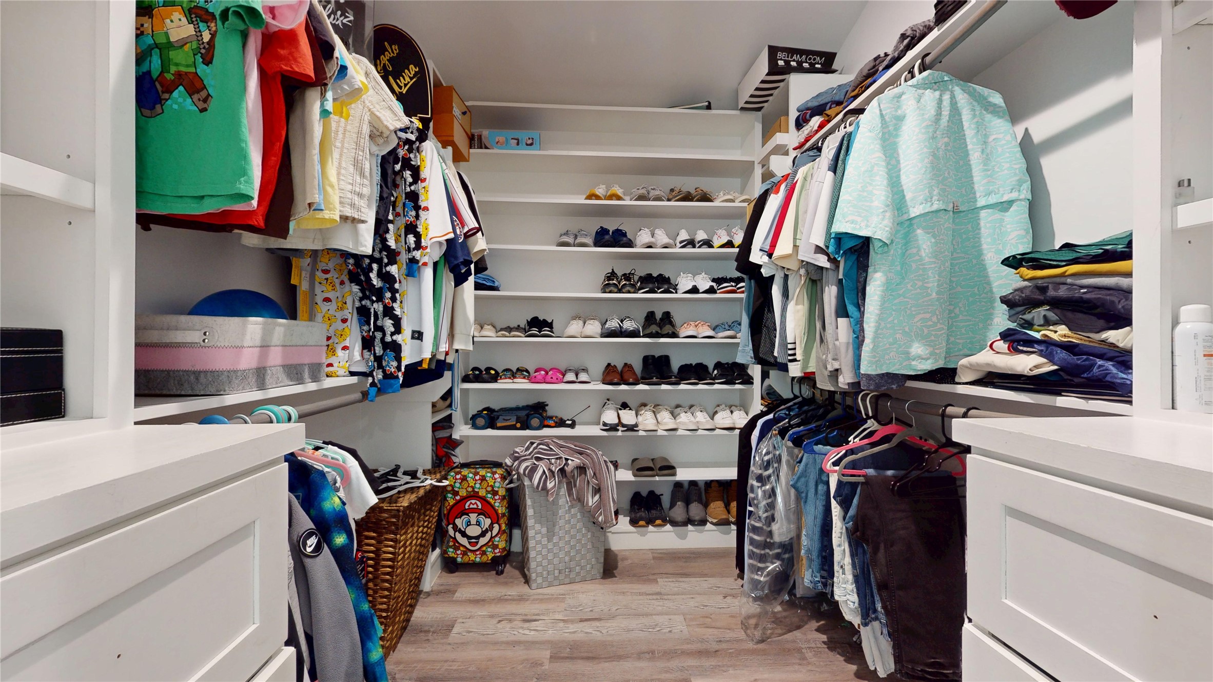 827 Dondell Street Channelview, TX 77530 - Photo 30 of 49 827 Dondell St, Walk in closet, with built in shelves and drawers.