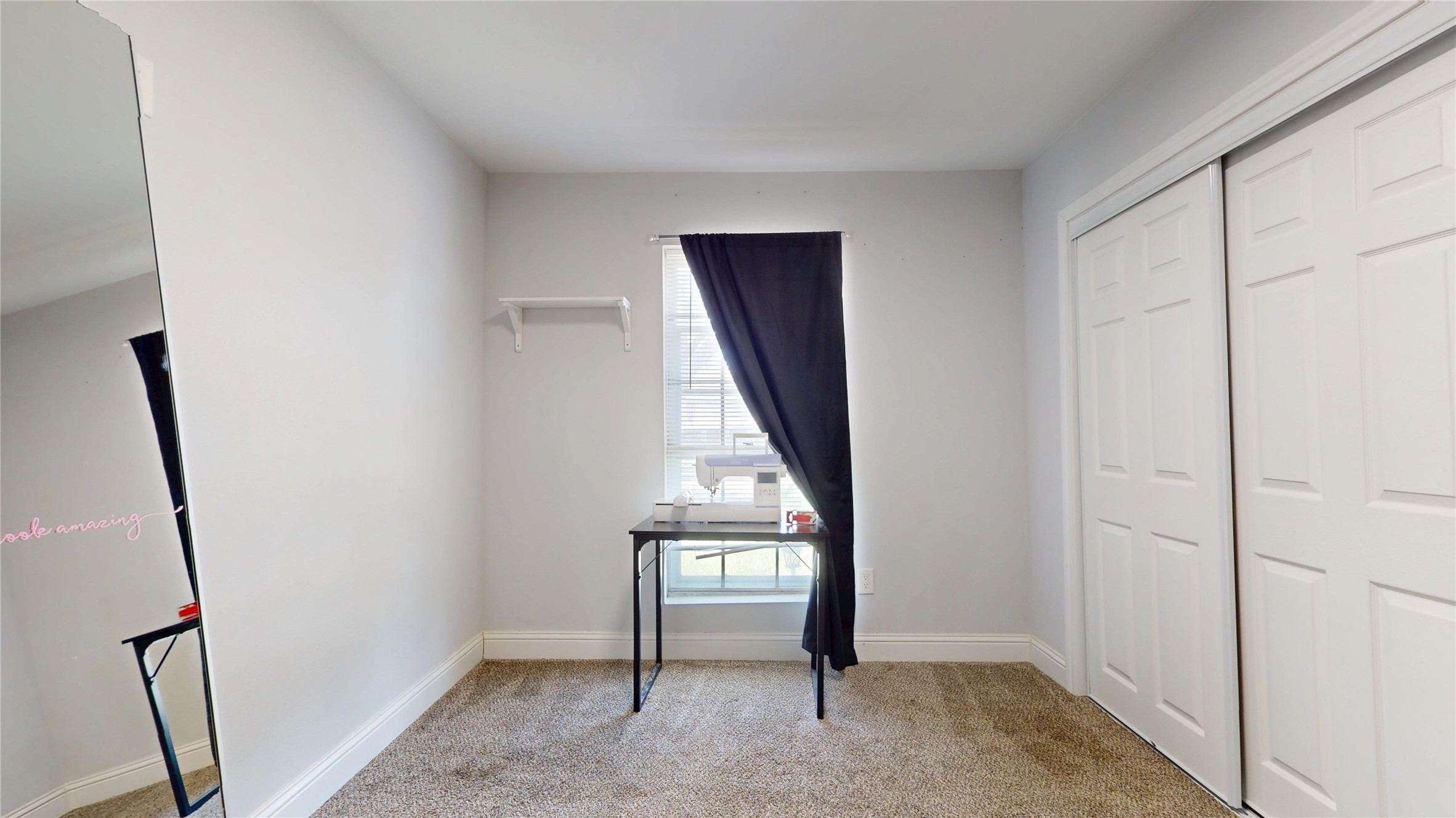 827 Dondell Street Channelview, TX 77530 - Photo 41 of 49 827 Dondell St, 6th bedroom with window facing the front of the house, double sliding doors to closet