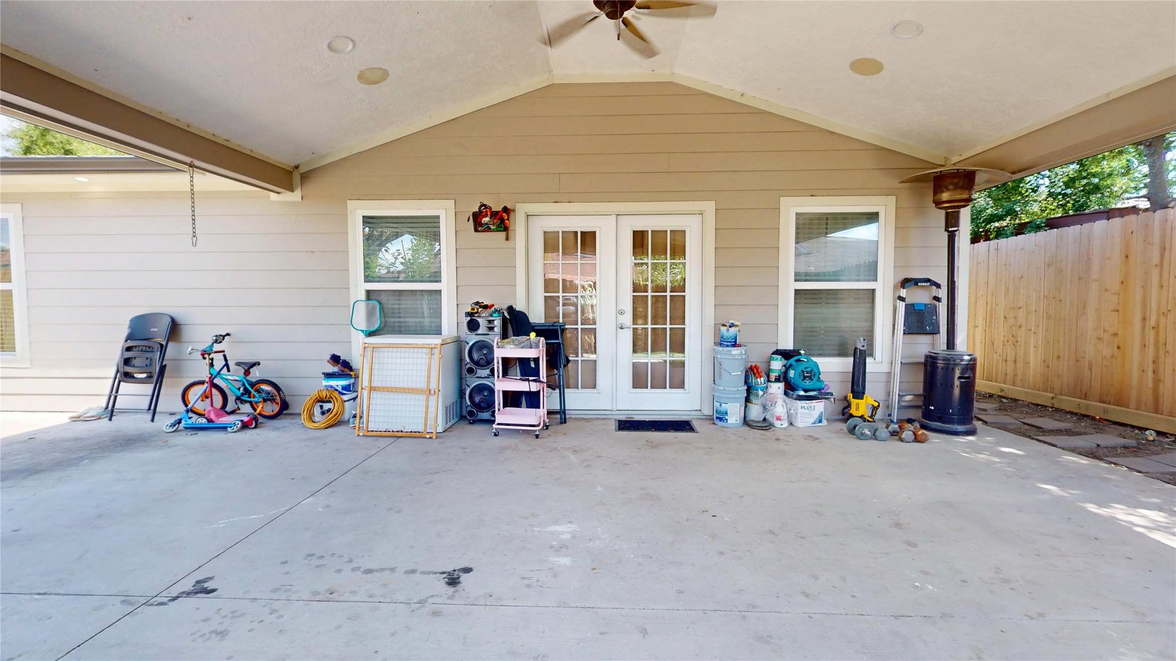827 Dondell Street Channelview, TX 77530 - Photo 45 of 49 827 Dondell St, Large covered pation with french doors to enter to living area.
