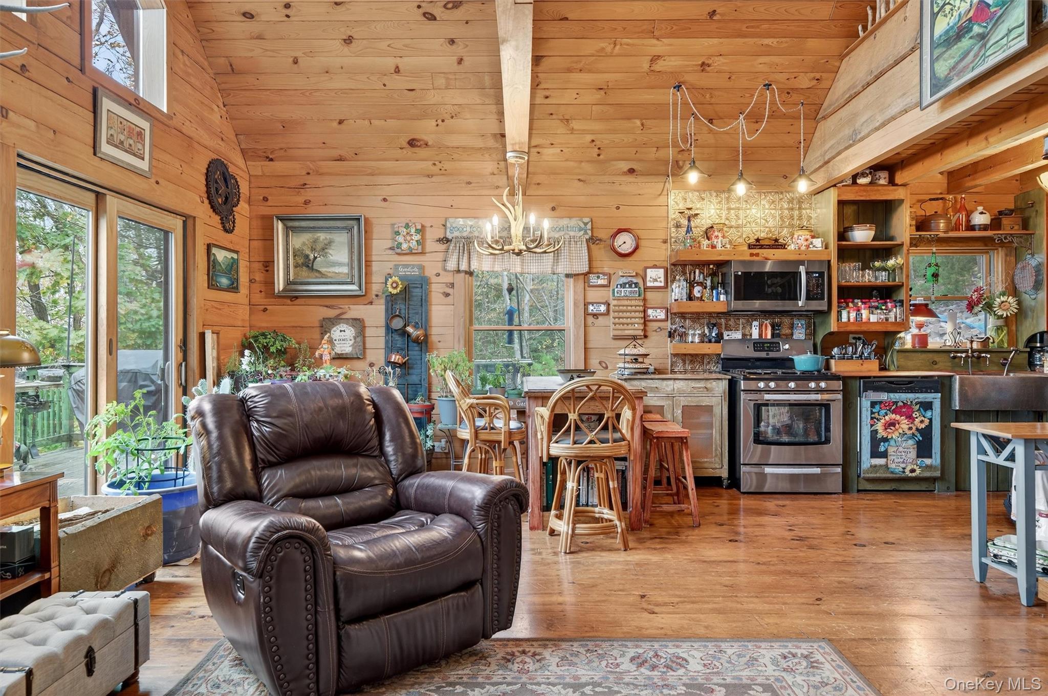 129 Hallock Road Barryville, NY 12719 - Photo 3 of 18 a living room with furniture and a flat screen tv