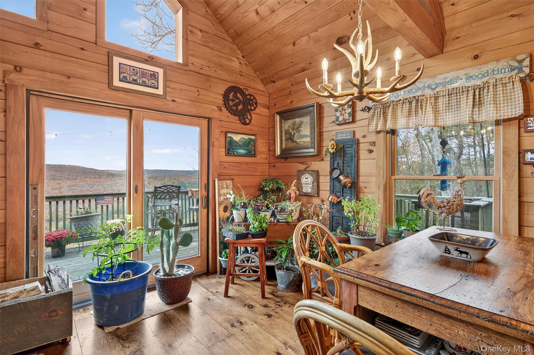 129 Hallock Road Barryville, NY 12719 - Photo 4 of 18 a view of a balcony and chairs and tables