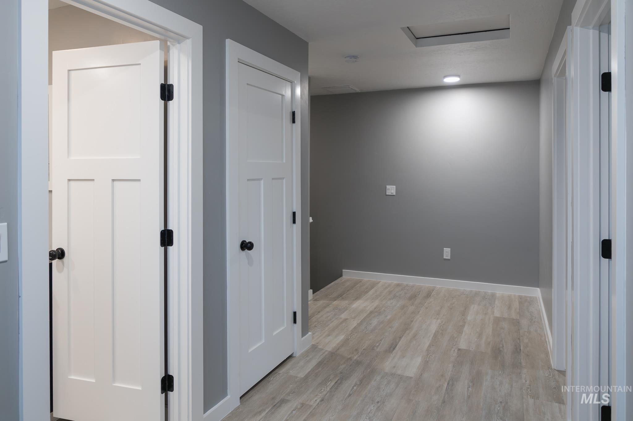 287 Southwest 6th Street, Unit 1 Ontario, OR 97914 - Photo 22 of 49 Hall featuring light wood-type flooring and baseboards