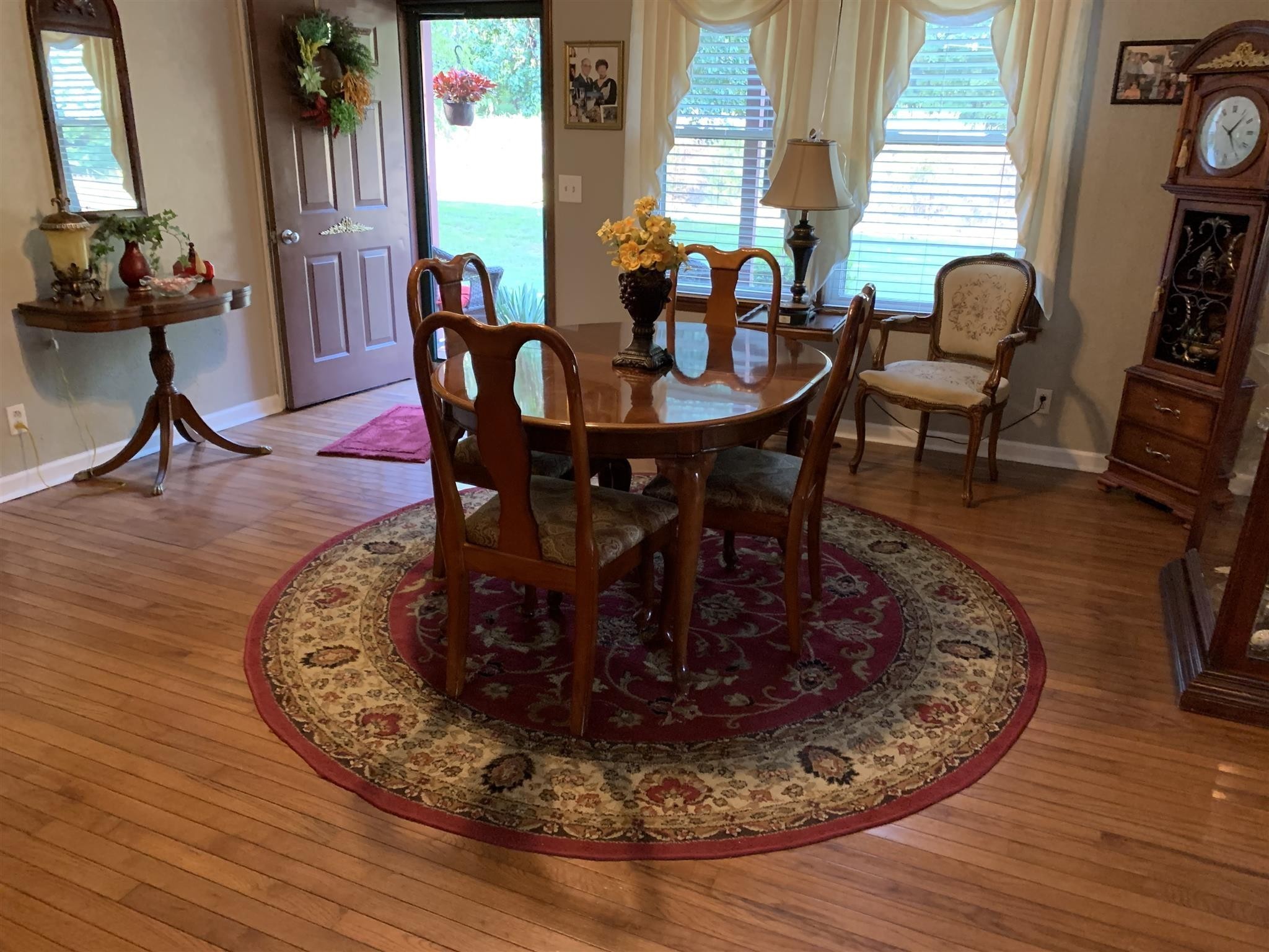 6069 Highway 76 East Springfield, TN 37172 - Photo 3 of 11 a view of a dining room with furniture window and wooden floor