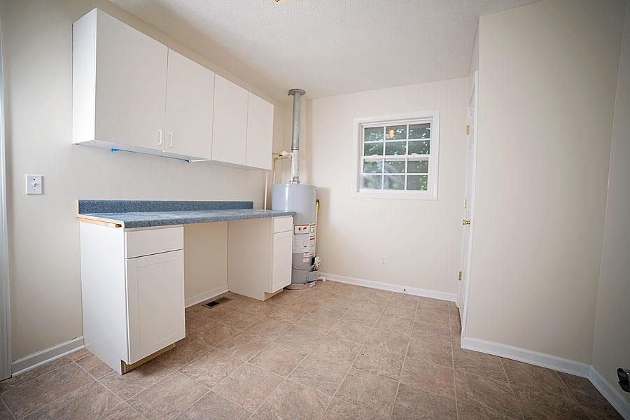 134 Hunt Creek Road Manchester, TN 37355 - Photo 13 of 14 What a Laundry Room! Storage galore