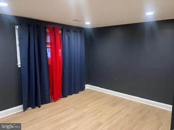 a bed room with a bed and a chair