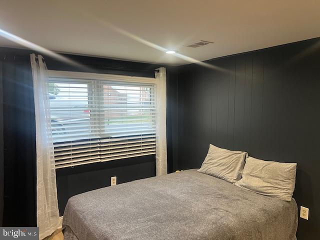 304 East Gordon Street Sterling, VA 20164 - Photo 15 of 17 a bedroom with a bed and a large window