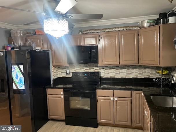 304 East Gordon Street Sterling, VA 20164 - Photo 3 of 17 a kitchen with stainless steel appliances granite countertop a refrigerator and a stove