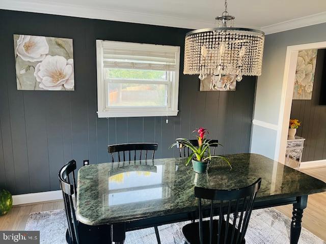 304 East Gordon Street Sterling, VA 20164 - Photo 6 of 17 a view of a dining room with furniture wooden floor and chandelier