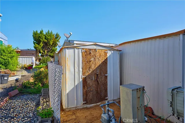 a view of balcony with plant and potted plants