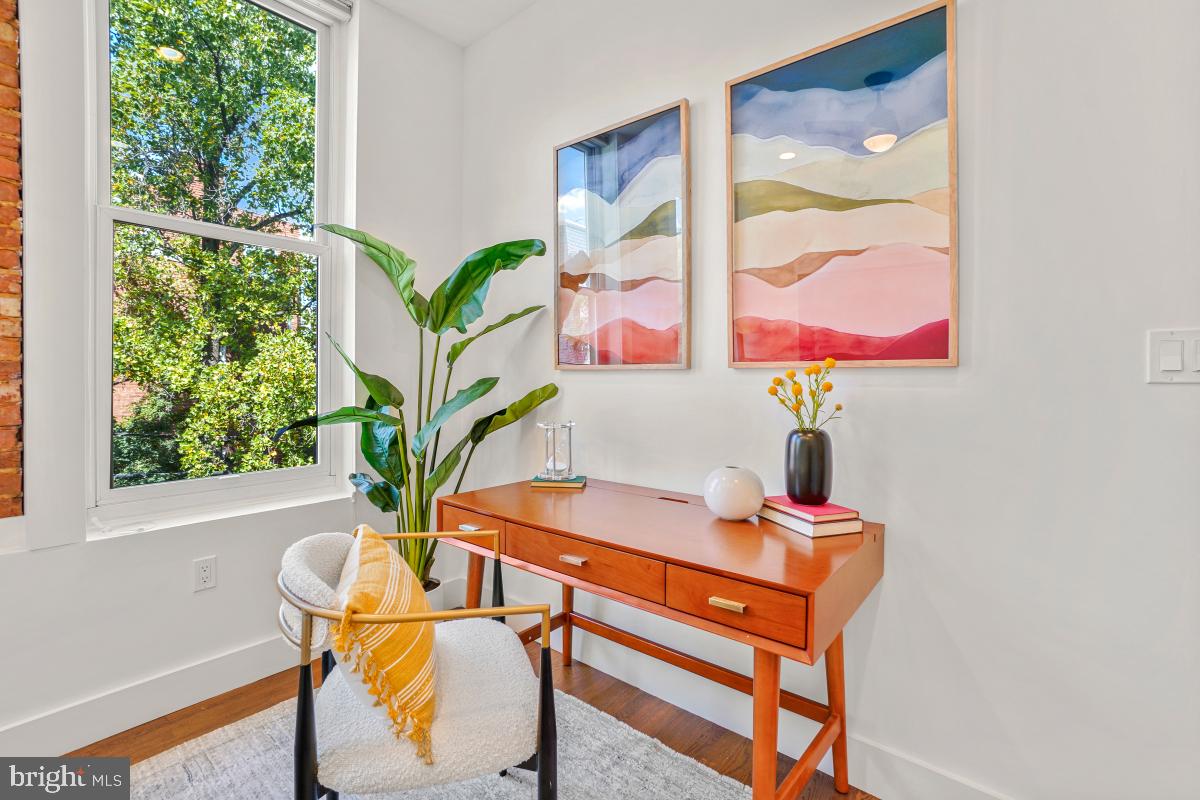 2107 S Street Northwest, Unit M Washington, DC 20008 - Photo 17 of 30 a view of a workspace with furniture