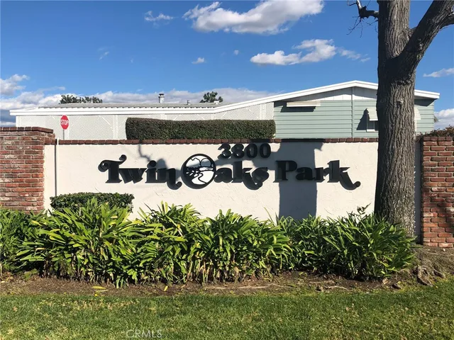 a front view of a building with garden