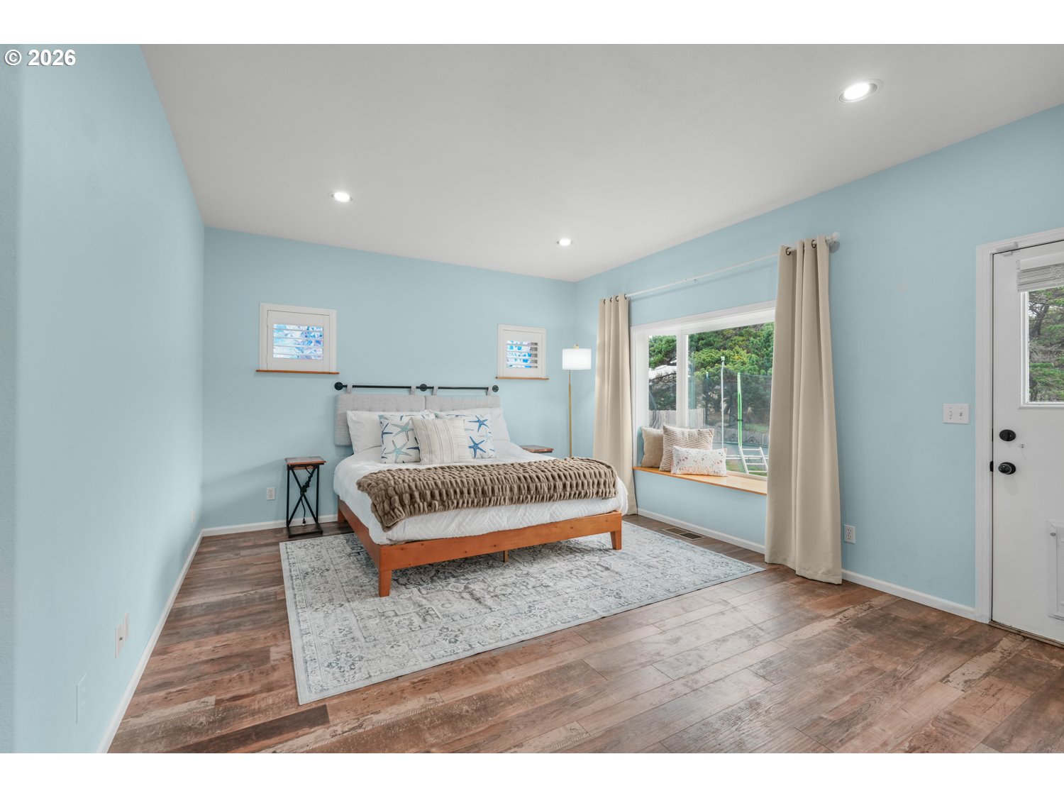 2927 Ruby Court Bandon, OR 97411 - Photo 16 of 38 a bedroom with a bed and window