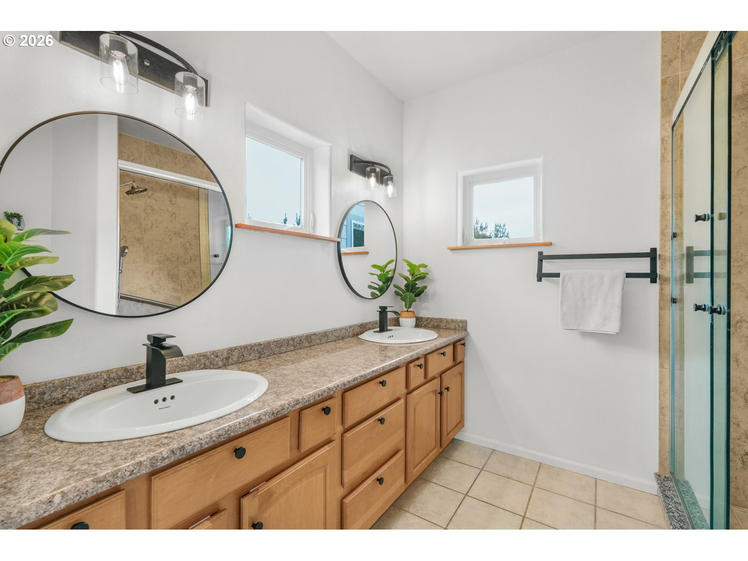 2927 Ruby Court Bandon, OR 97411 - Photo 17 of 38 a bathroom with a sink and a mirror