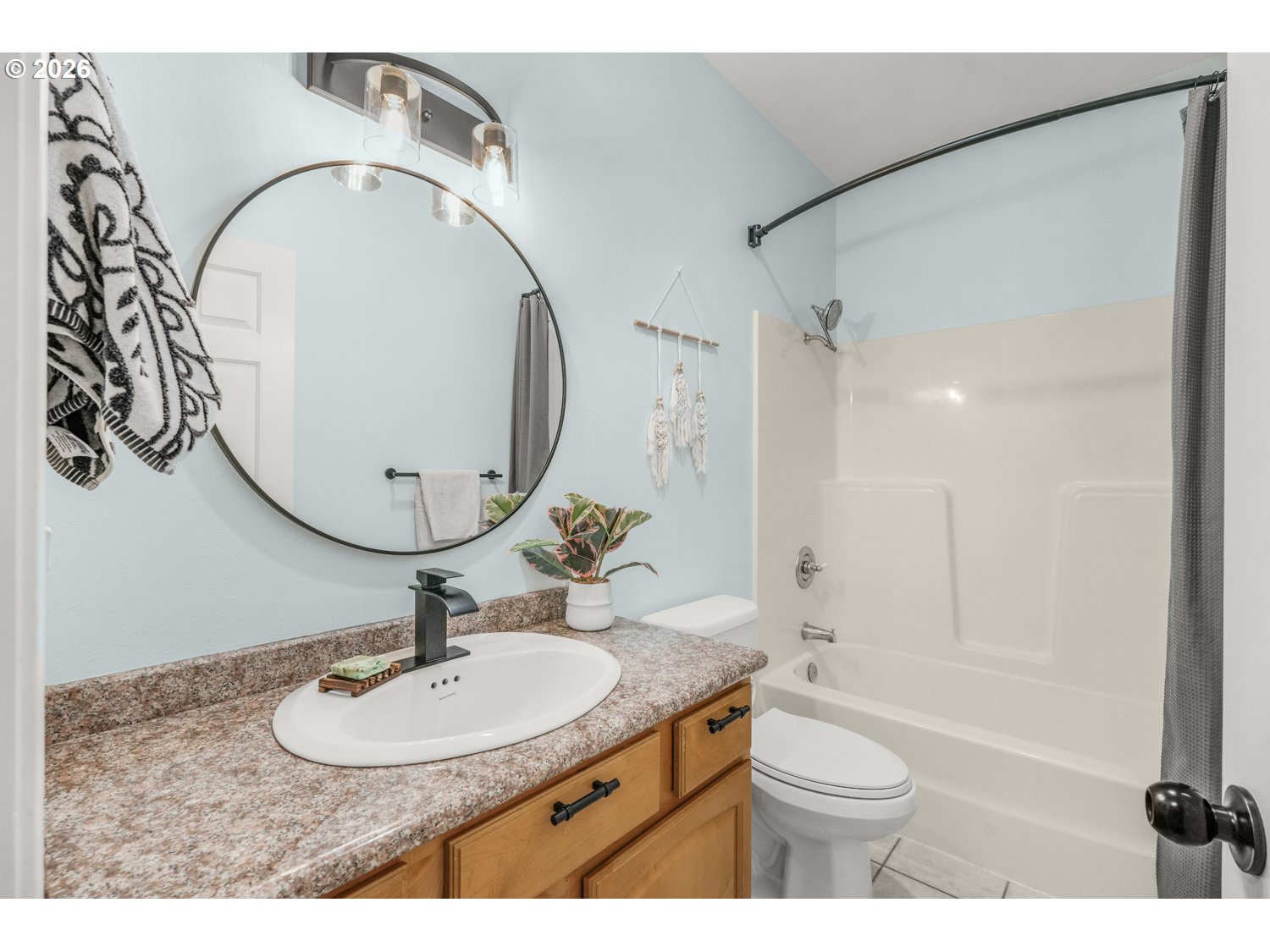 2927 Ruby Court Bandon, OR 97411 - Photo 22 of 38 a bathroom with a sink toilet and shower