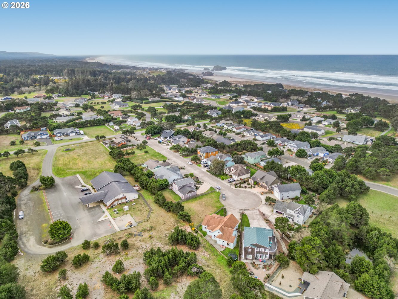 2927 Ruby Court Bandon, OR 97411 - Photo 34 of 38 an aerial view of residential houses with outdoor space