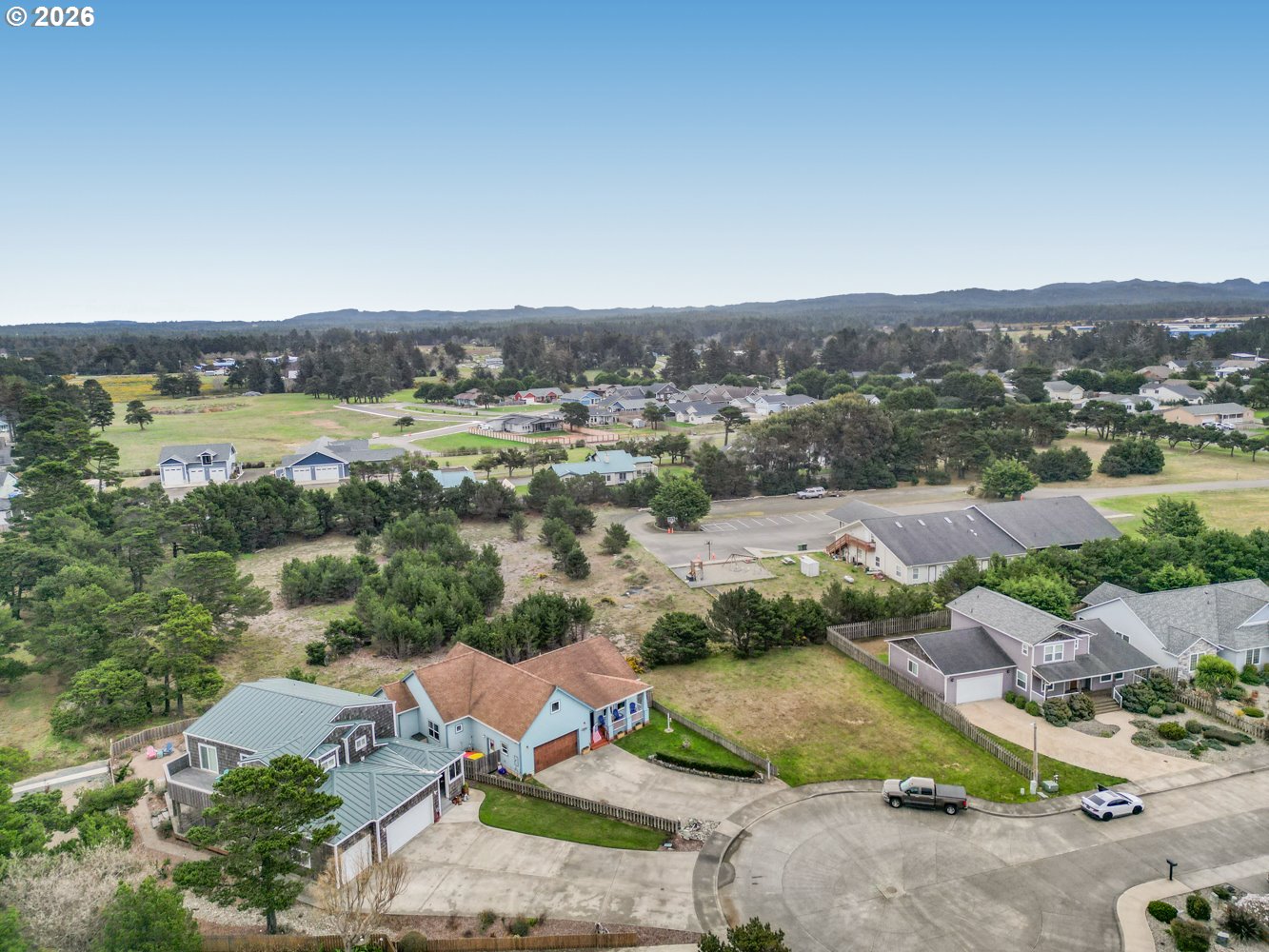 2927 Ruby Court Bandon, OR 97411 - Photo 37 of 38 an aerial view of a houses with a outdoor space