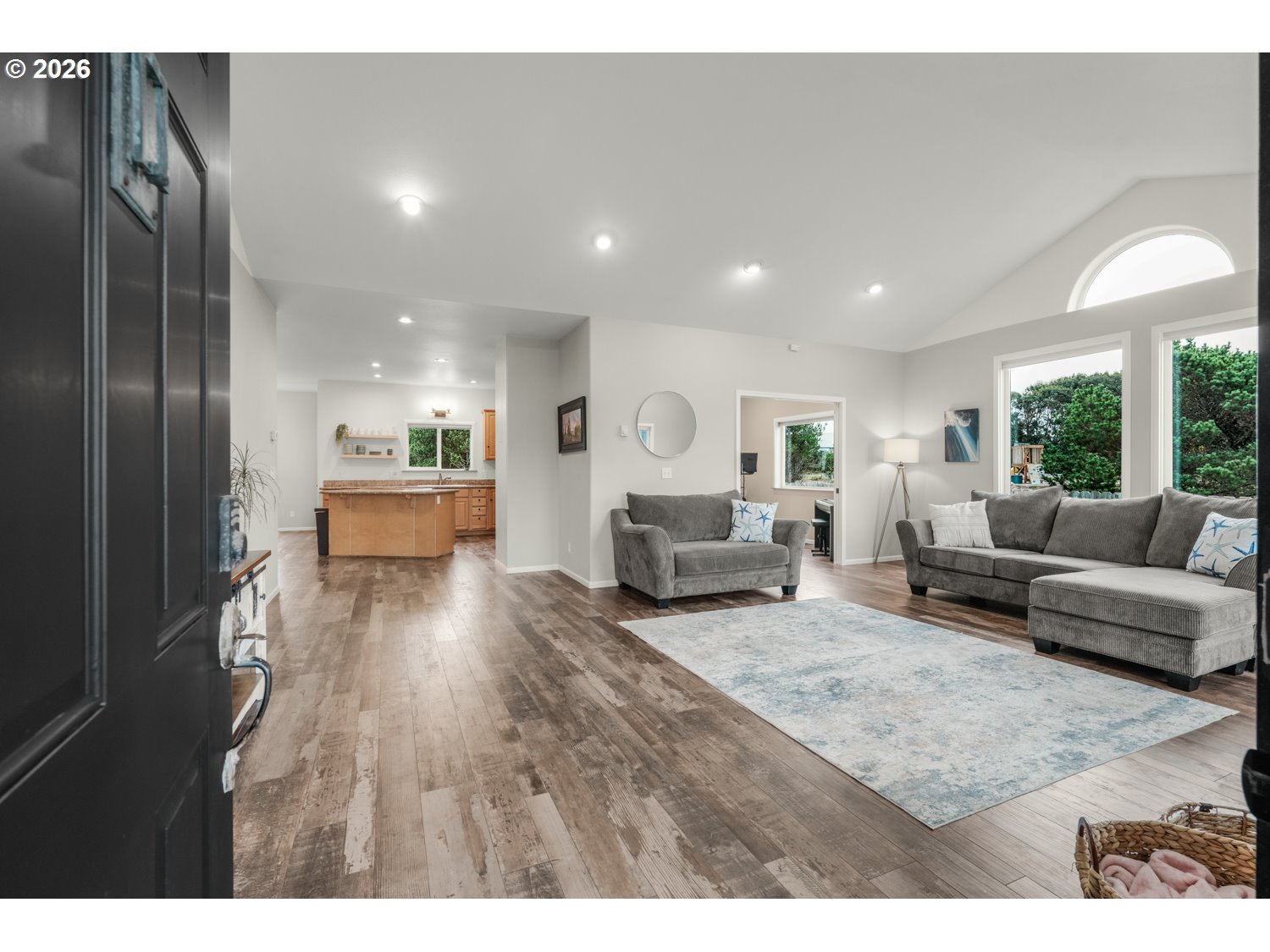 2927 Ruby Court Bandon, OR 97411 - Photo 4 of 38 a living room with furniture and a wooden floor