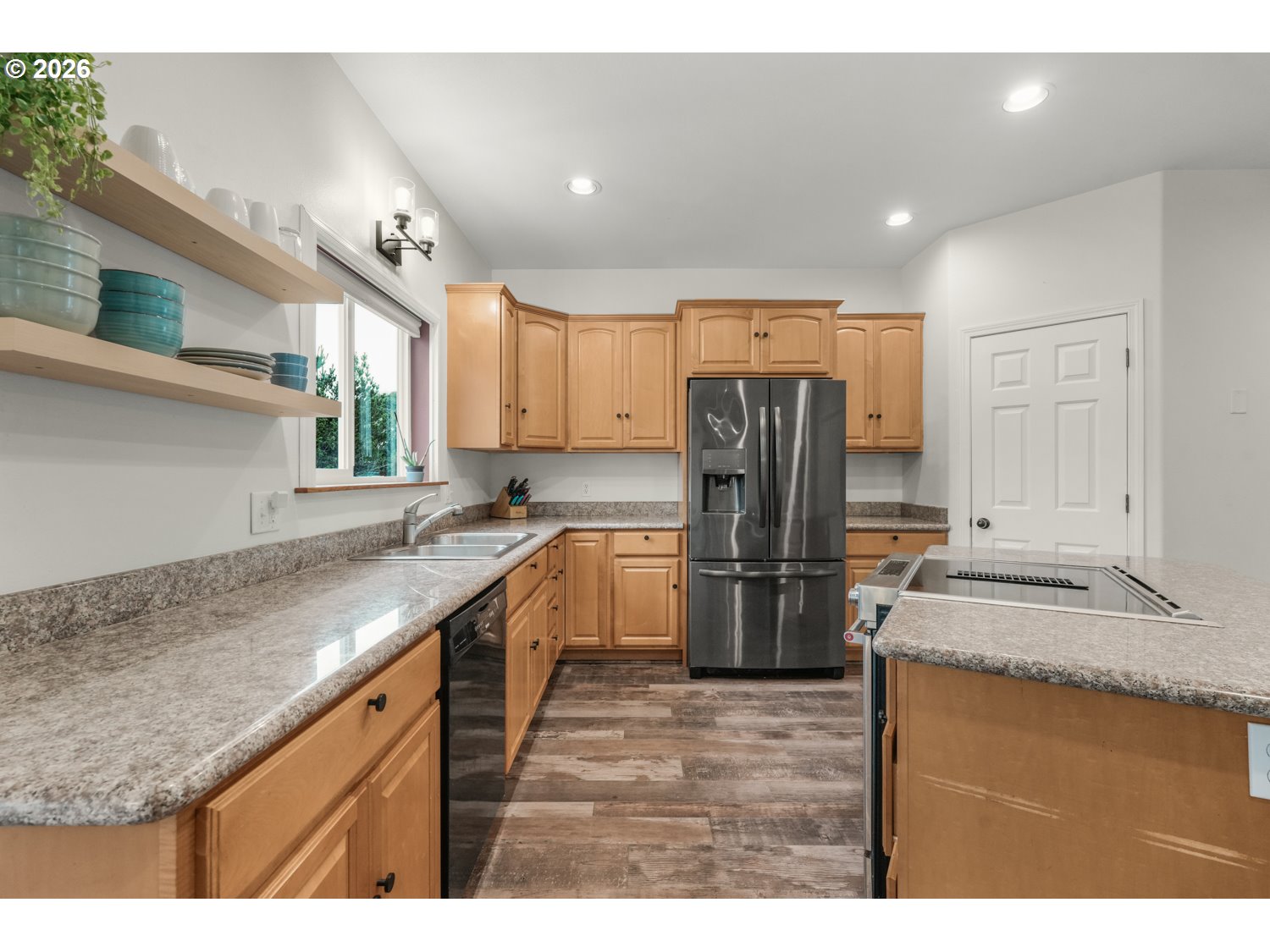 2927 Ruby Court Bandon, OR 97411 - Photo 10 of 38 a kitchen with a refrigerator sink and stove