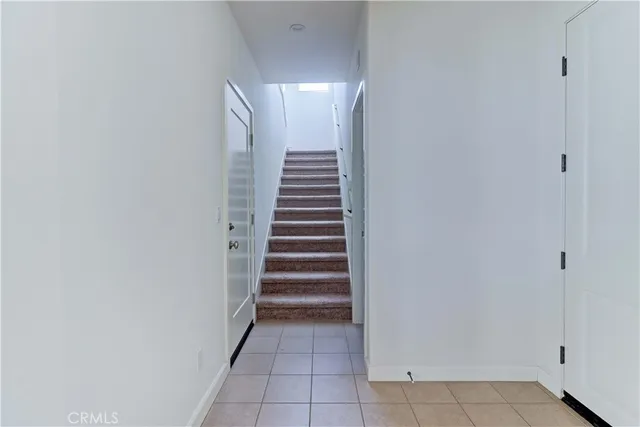 a view of entryway with stairs