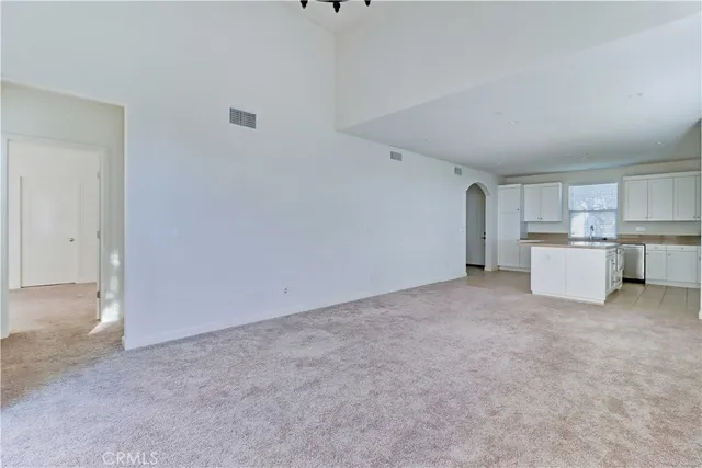 a view of a kitchen with a sink cabinets and window