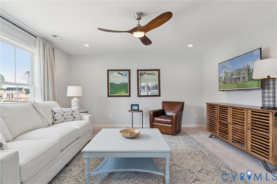 Lot 15 Robins Ridge Drive Moseley, VA 23120 - Photo 13 of 18 a living room with furniture and a rug