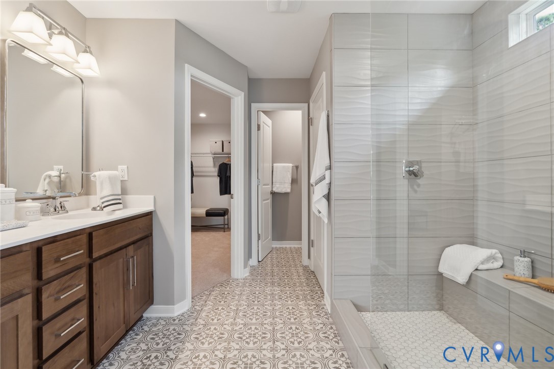 Lot 15 Robins Ridge Drive Moseley, VA 23120 - Photo 4 of 18 a bathroom with a sink a toilet and shower