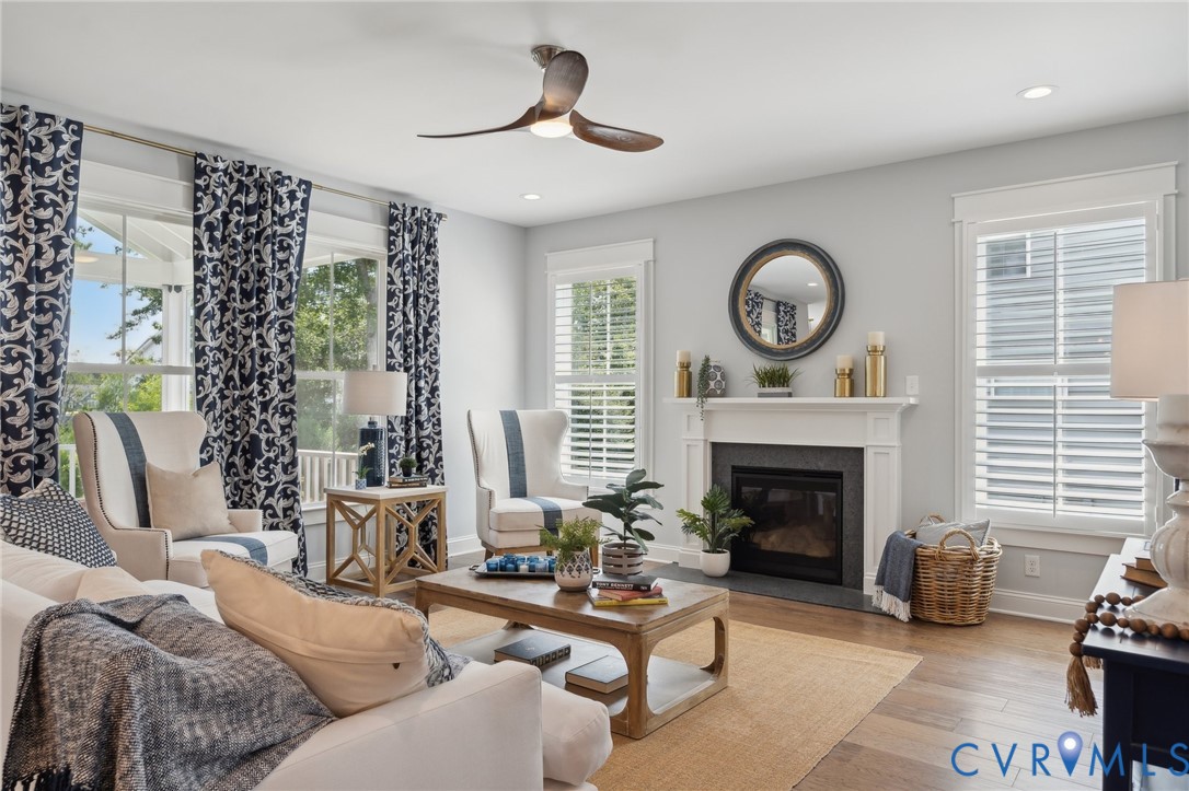 Lot 15 Robins Ridge Drive Moseley, VA 23120 - Photo 7 of 18 a living room with furniture a fireplace and a large window