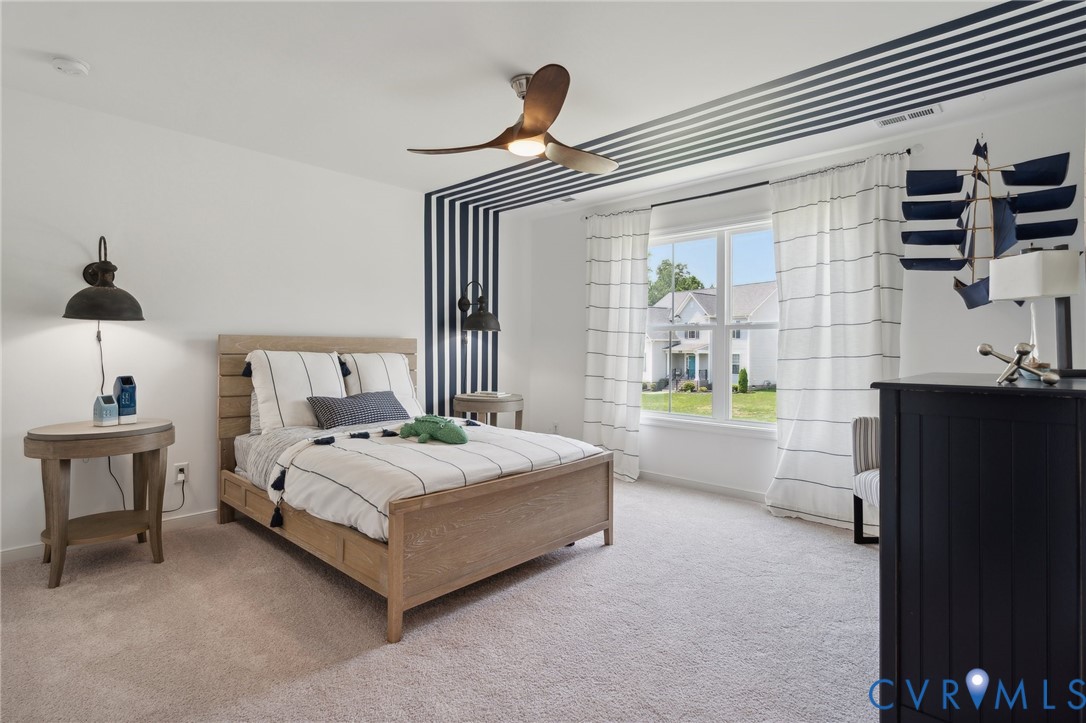 Lot 15 Robins Ridge Drive Moseley, VA 23120 - Photo 9 of 18 a spacious bedroom with a bed and a window