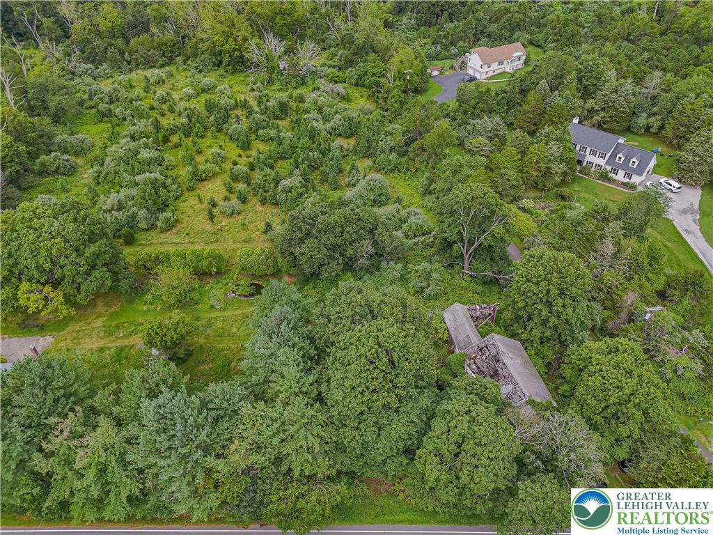 45 Everittstown Road Frenchtown, NJ 08825 - Photo 4 of 16 an aerial view of a house with lots of trees