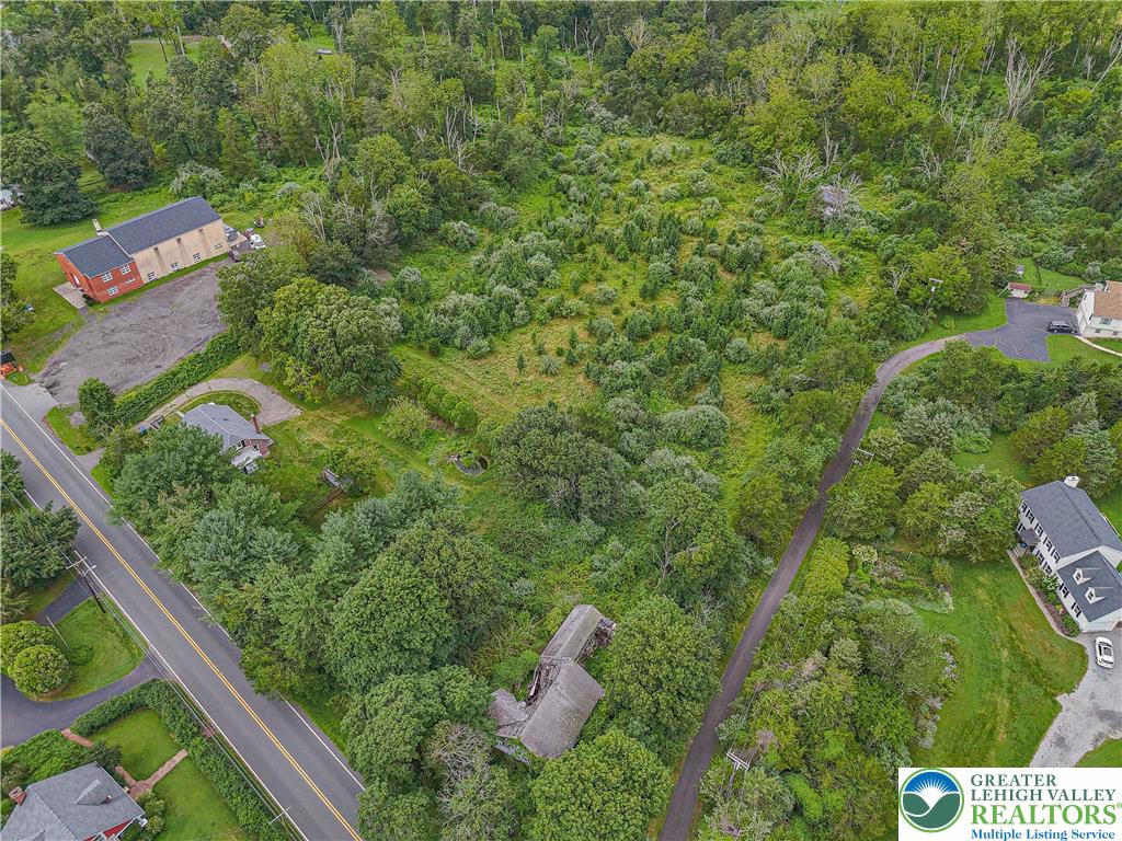 45 Everittstown Road Frenchtown, NJ 08825 - Photo 7 of 16 an aerial view of residential house with outdoor space and trees all around